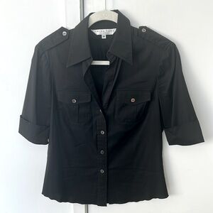 Trina Turk short sleeve button front shirt. Black, Size M.